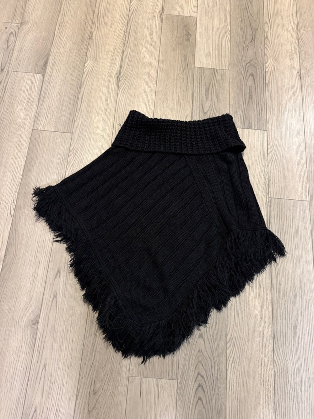 Energie Black poncho in good used condition
